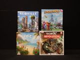 trois livres posés sur une surface noire
