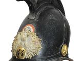 a black helmet with a red pom pom on top of it