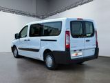 a white van that is parked inside of a building