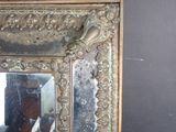 a mirror that is on the wall in the room