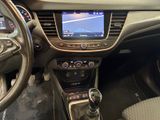 the interior of a car with a steering control and dashboard controls