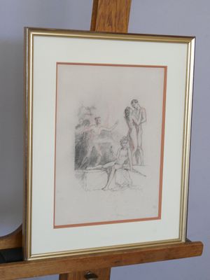 dessin encadré représentant un homme et une femme, posé sur un chevalet