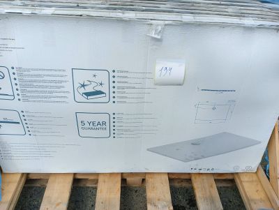 a box that has a laptop on it on a pallet