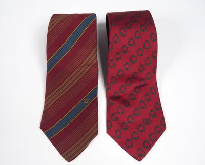 pair of men ' s neck ties on white background with red and blue stripes