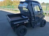 an image of a utility vehicle parked on the side of the road