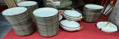 many plates that are stacked on a red table
