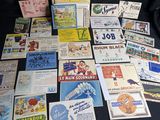 many different types of advertising posters on the table