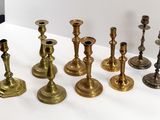 a lot of candles that are sitting on a table