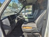 a seat in the back of a truck that is parked