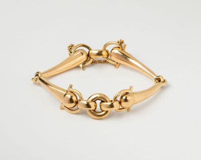 an image of a gold bracelet on a white background