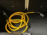 a yellow cord connected to a yellow cord in a black box