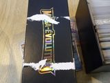 a box with a bunch of cards in it on a table