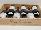 six bouteilles de vin dans un coffret en bois