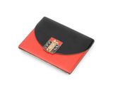 a black and red wallet with a crest on the front