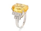 a yellow sapphire and diamond ring