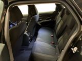 the back seats of a car with a blue seat cover