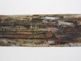 a piece of art that looks like a piece of wood