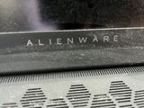 a close up of a laptop with the alienware logo on it