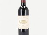 a bottle of wine that is sitting on a table