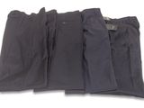 three men ' s pants are lined up on a white surface