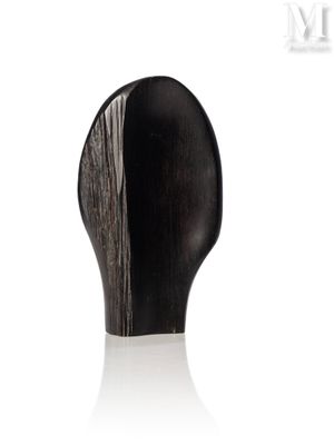 an image of a close up of a wooden object on a white surface