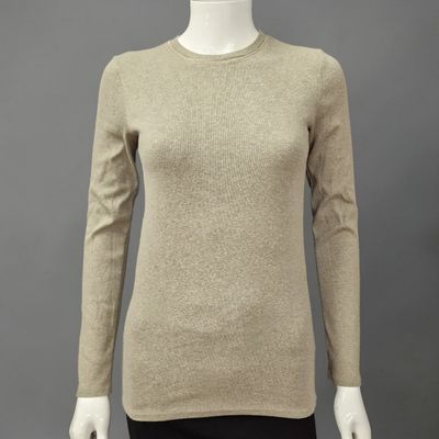 a woman ' s beige sweater on a mannequin mannequin mannequin mannequin mann