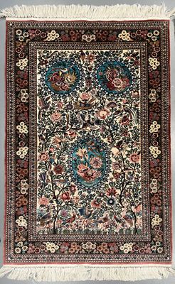 an antique persian rug with a floral design and fringe fringes
