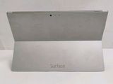 the surface of a tablet computer sitting on top of a white table