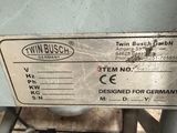 a label on the back of a machine that says win buschch