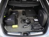 a trunk of a car with luggage in it