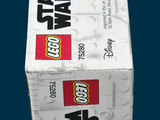 a box of legos sitting on a blue surface