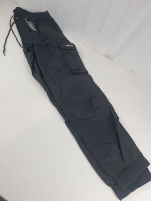 a pair of black cargo pants laying on a white surface