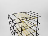 a black and yellow wire rack with six bottles of wine