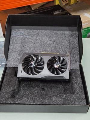 the box is open to show the two fan blades in it