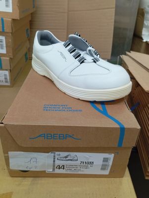a box with a pair of shoes on top of it