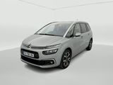 a silver citrole is parked in a white room