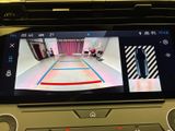 a picture of a car dashboard with a camera on it