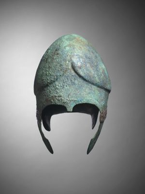 a close up of a helmet on a gray background