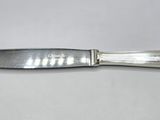 a knife that is sitting on a table
