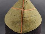 a close up of a hat on a mannequin head