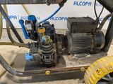 an image of a pump with a hose attached to it