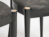 two chairs that are next to each other on the floor