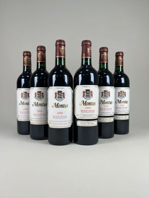 six bottles of wine are lined up in a row