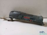 an image of a close up of a small tool on a table