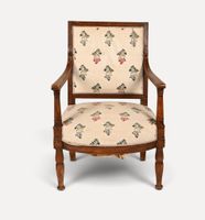 Fauteuil en bois mouluré et sculpté.