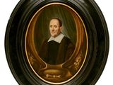 portrait d'un homme vêtu d'un manteau noir à col blanc