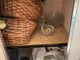 a wicker basket sitting on a shelf in a cabinet