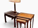 two tables with a lamp on top of them and a table with a lamp on top of it