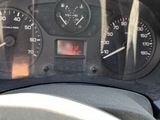 a close up of a car dashboard with a speedometer and gauges