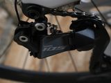a close up view of a bicycle ' s front derail